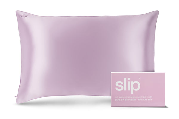A lilac slip silk queen pillowcase with branded packaging on a white background.
