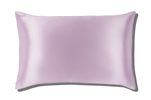 A lilac slip silk queen pillowcase on a white background.