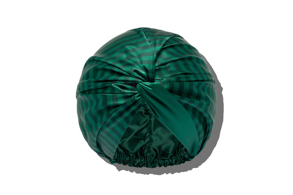 Green striped turban / bonnet on a white background